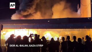 Israeli strike on hospital tent camp in Gaza kills 4, ignites fire that burns dozens.