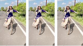 The girl dancing on the bike