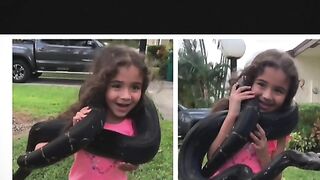 Little Girl Wraps A Giant Snake Around Her Neck, Internet Slams "Content Hungry" Parents
