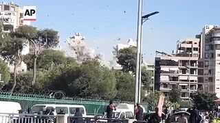 Video captures Beirut building collapsing after Israeli strike.