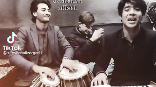 Friends gathering singing Pashto song