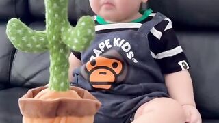 baby cute crying because of dancing cactus toy __ baby funny(