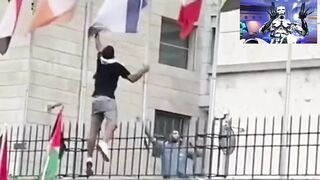 Young man lowers pig flag