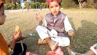 Kids are eating and fun at park