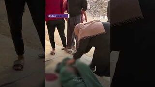 Palestinians recover bodies of those killed by Israeli air strikes