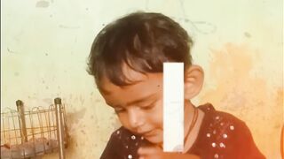 A cute baby try to eating tomato ????