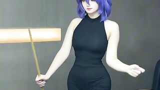 cosplay woman playing billiards
