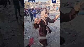 Palestinian mother frantically searches for her children