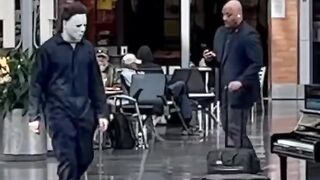 Michael Myers plays piano at the @INDairport with Cat