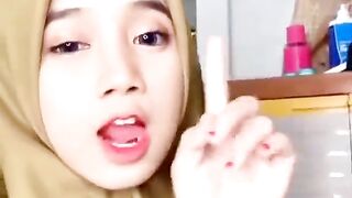 Girl in Indonesia is bored