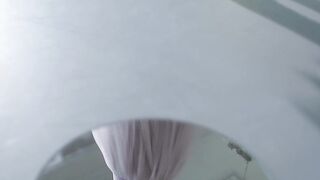 A Reflection of a Woman Dancing Ballet