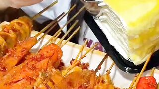 Eating Fried skewers with spicy hotpot are so delicious