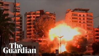 Israeli strike causes huge explosion and rocks building in Beirut
