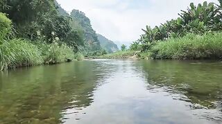 A very unique way to trap fish, Ana arranges rocks to create a trap to catch fish in the stream.