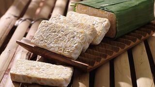 Cooking traditional food Tempe