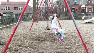 Awesome dad perfects swing stunt at the park