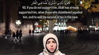 A nice Muslim girl is riciting the holy Qur'an
