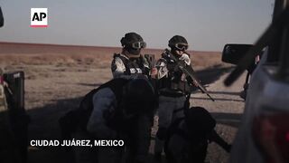 Mexico deploys the first of 10,000 National Guard troops to US border.