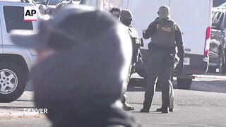 Federal immigration officials launch raids in Denver area.