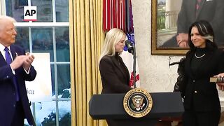 Tulsi Gabbard is sworn in as Trump's director of national intelligence.