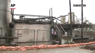 Storms threaten to cause new damage in fire-scorched Southern California.