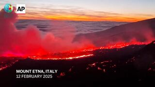 Italy's Mount Etna erupts in dramatic fashion, disrupting air travel.