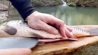 Cooking fish in the river