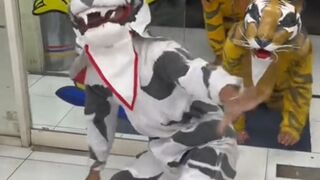 video of tiger costume entering Alfamart
