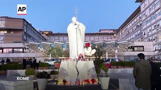 Faithful pray for Pope Francis as he remains in critical condition.