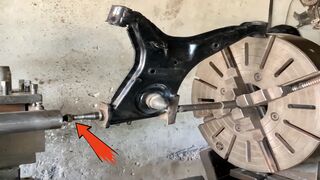 did a thread & bearing size repair a car rear left lower arm spindle restoration on Lathe Machine