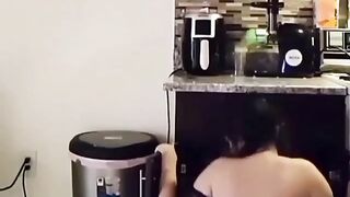 Pretty Girl Working In The Kitchen
