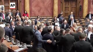 Chaotic scene erupts in Serbia's parliament amid political tensions.