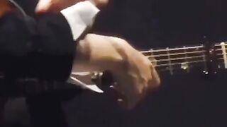 Bts suga playing guitar In his concert