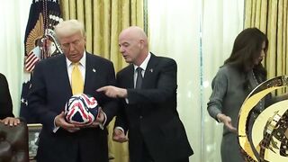FIFA President hands President Trump