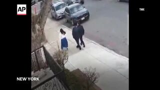 Family narrowly avoids being struck by falling tree in New York.