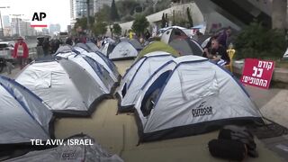 Gaza hostage relatives camp outside Israeli Defence Ministry in Tel Aviv.n