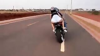 She on the motocicleta