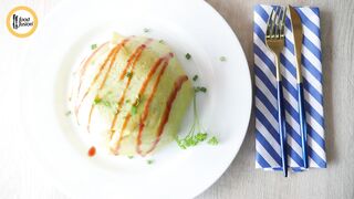 Omurice, a very tasty and different rice recipe for you today. We added our little touch of fusion to it and it came out just perfect
