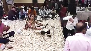 A Singer with pile in currency notes