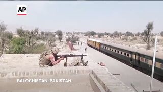 Pakistan says insurgents who attacked train killed 21 hostages.