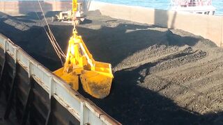 Coal loading at sea