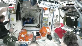 NASA’s stuck astronauts welcome their replacements to the space station.