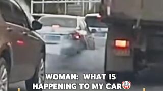 WOMAN: WHAT IS HAPPENING TO MY CAR???? On the 17th, in Shandong, a truck accidentally blew a tire while waiting