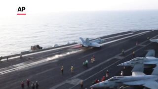 Fighter jets take off from aircraft carrier as Trump orders strikes on Yemen's capital.