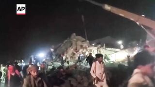 People search for bodies under rubble in Yemen's Saada after US strike.