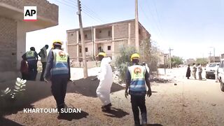 Dead children among bodies pulled from well in Sudan after fighters withdraw from area.