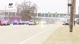 Police confirm a shooting at a Michigan hospital, suspect remains at large.