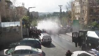 Police crack down on large protest near residence of Israel PM Netanyahu.
