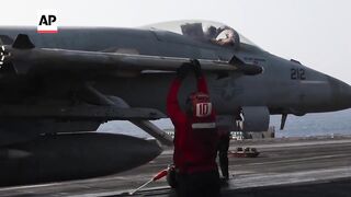 US Navy jets take off in the Red Sea as airstrikes on Yemen continue.