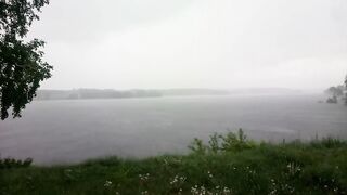 A powerful lightning bolt hits the lake